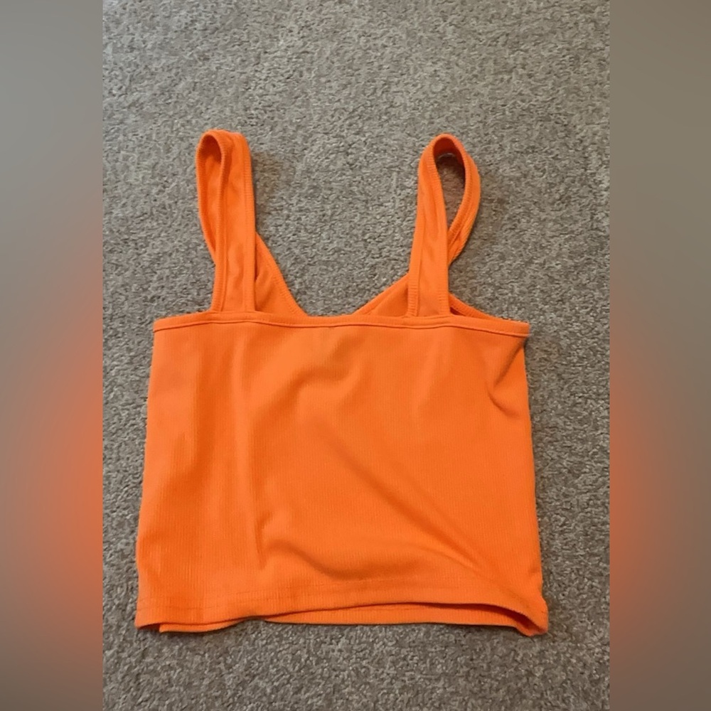 Neon orange crop top.